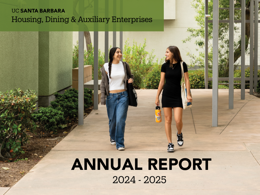 two students walking near residence hall