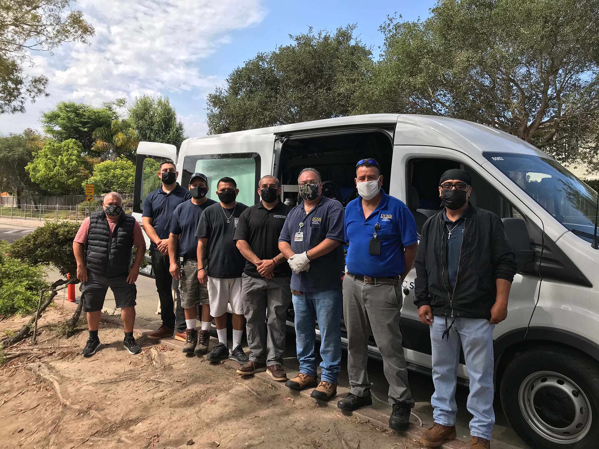 Residential Operations Team in front of service vehicle.