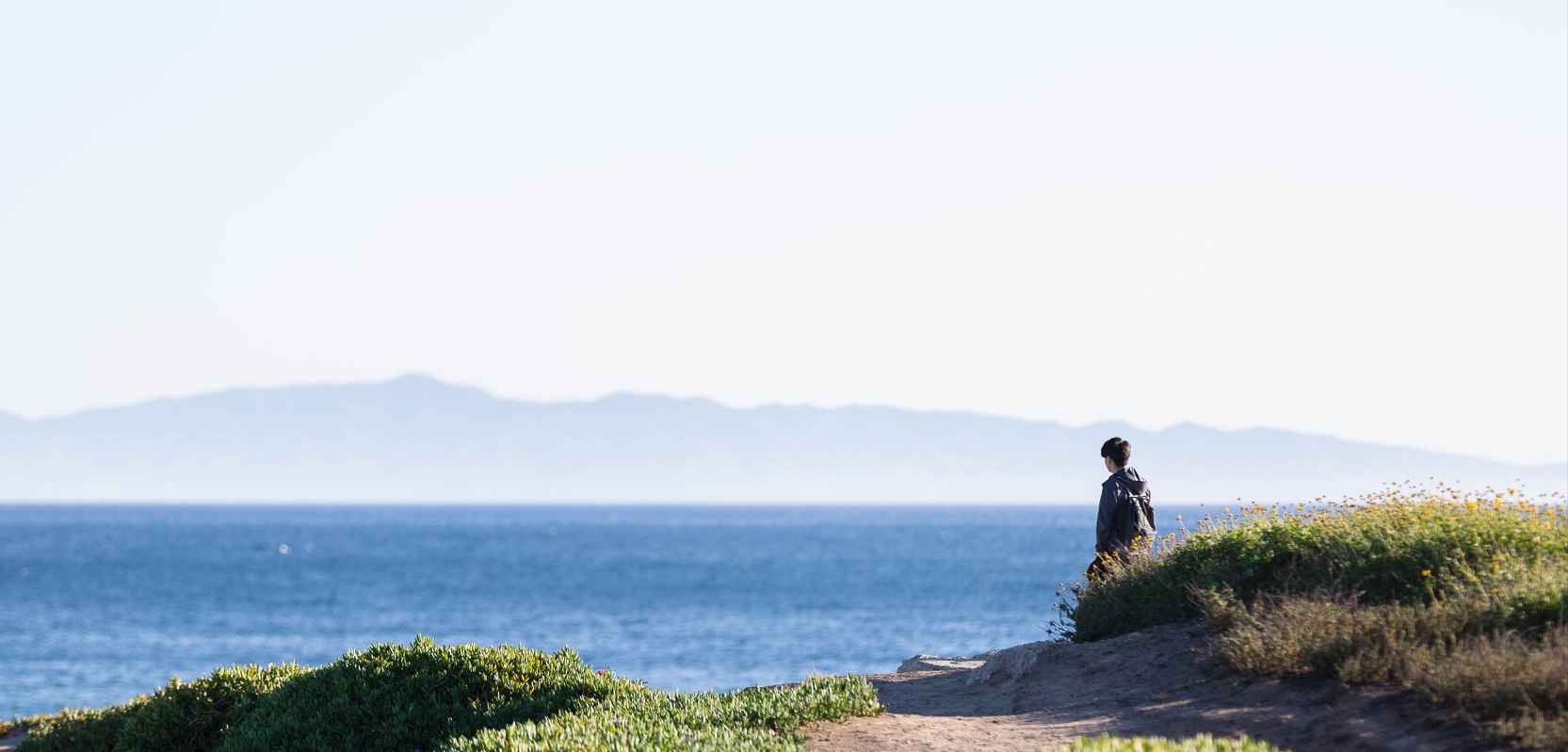 Person enjoying the beautiful view from UCSB.