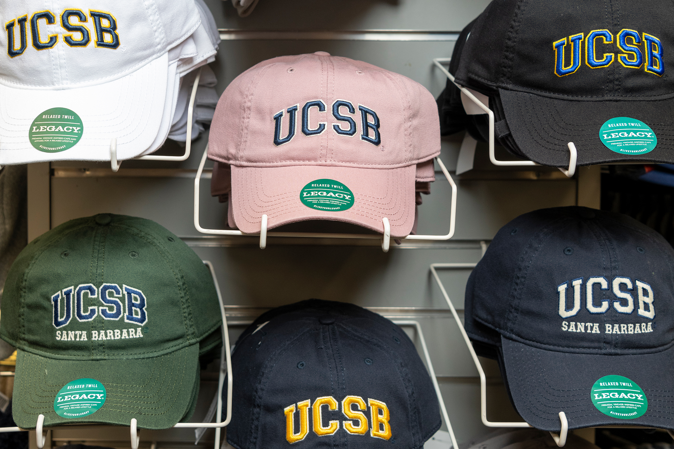 ucsb hats on display at the campus store 