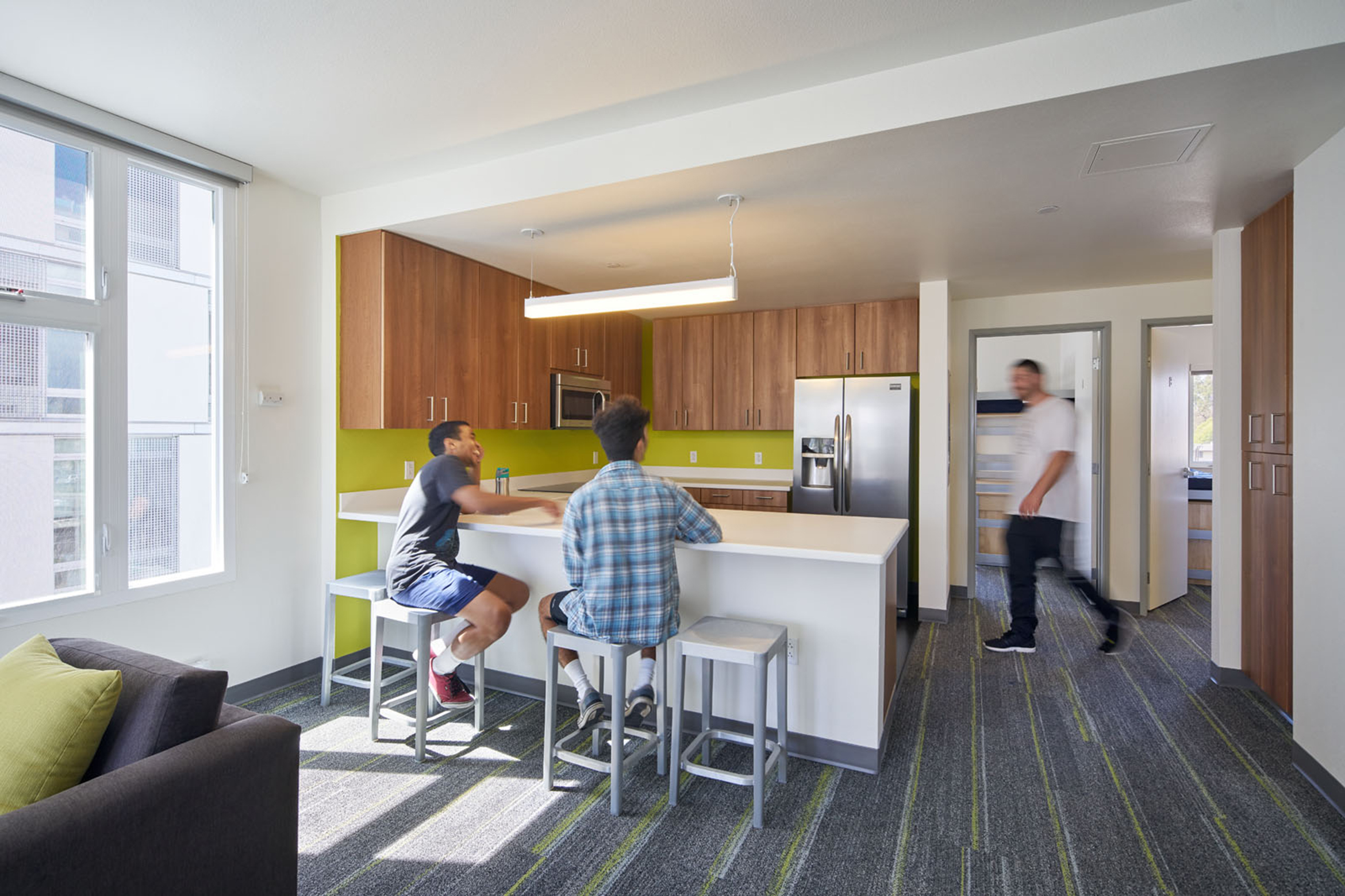 ucsb students sitting in an Sierra Madre apartment