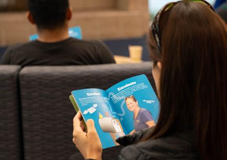 employee reading wecare welcome booklet