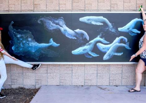 San Rafael Resident Assistant Loni Marineau and Sydni Baker in front of the Whale Mural